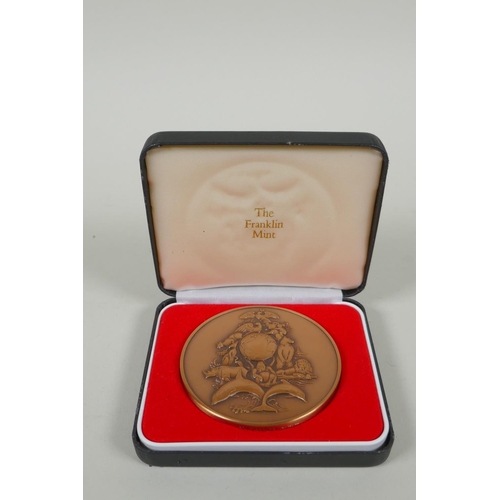 229 - A Franklin Mint solid bronze commemorative medallion/2001 year calendar, 7.5cm diameter