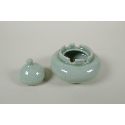 231 - A Chinese celadon crackle glazed porcelain censer and cover, 11cm diameter