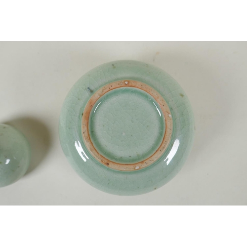 231 - A Chinese celadon crackle glazed porcelain censer and cover, 11cm diameter