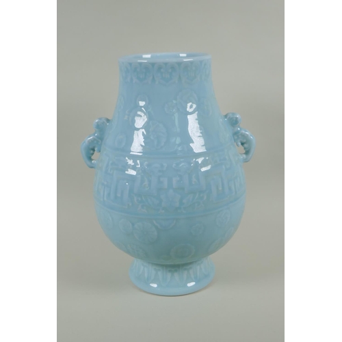 235 - A Chinese celadon ground porcelain two handled vase with underglaze archaic style decoration, 35cm h... 