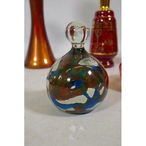 237 - A studio glass sleeve vase, Bohemian overlaid and etched glass vase, Caithness and Mdina paperweight... 