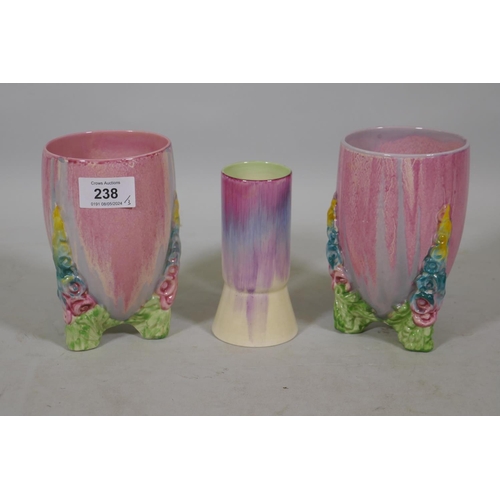 238 - A pair of Clarice Cliff Wilkinsons My Garden pattern vase, and a Newport vase, 15cm high