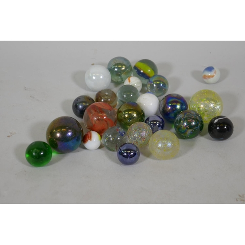 240 - A quantity of large vintage marbles with speckled and lustre finish, largest 4cm diameter