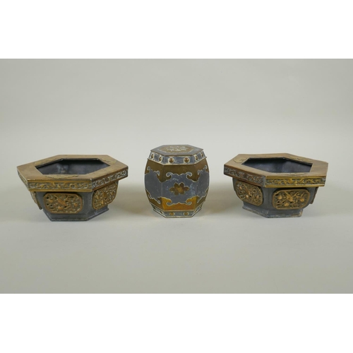 245 - An antique Chinese pewter and brass hexagonal tea caddy, and a pair of matching planters, caddy 10cm... 