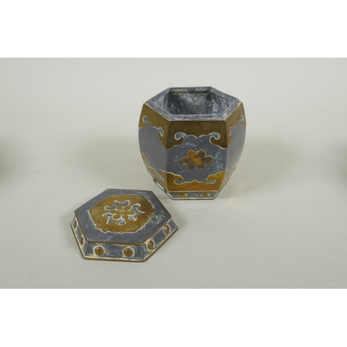 245 - An antique Chinese pewter and brass hexagonal tea caddy, and a pair of matching planters, caddy 10cm... 