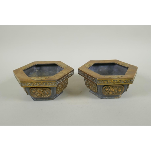 245 - An antique Chinese pewter and brass hexagonal tea caddy, and a pair of matching planters, caddy 10cm... 