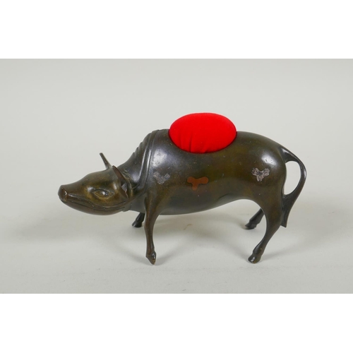 251 - A Japanese Mokume-gane metalware pin cushion in the form of a buffalo, with inlaid decoration, 14cm ... 