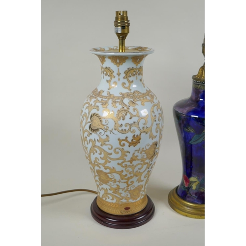 252 - A Rubens ware pomegranate vase converted to a table lamp with brass mounts, together with a gilt por... 