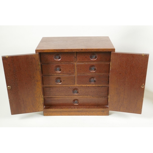 255 - An American Oriental style jewellery cabinet with bars mounts, and a miniature pine dresser, 37cm hi... 