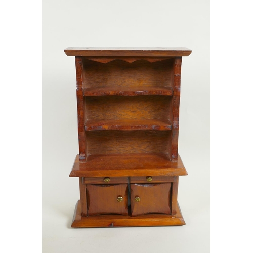 255 - An American Oriental style jewellery cabinet with bars mounts, and a miniature pine dresser, 37cm hi... 