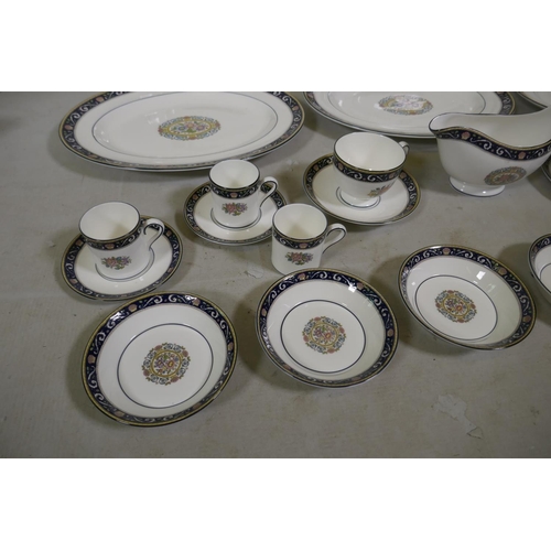 263 - A Wedgwood Runnymede part dinner service, to include oval serving plates and bowls, a gravy boat, cu... 