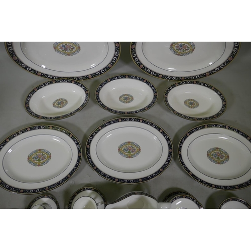 263 - A Wedgwood Runnymede part dinner service, to include oval serving plates and bowls, a gravy boat, cu... 