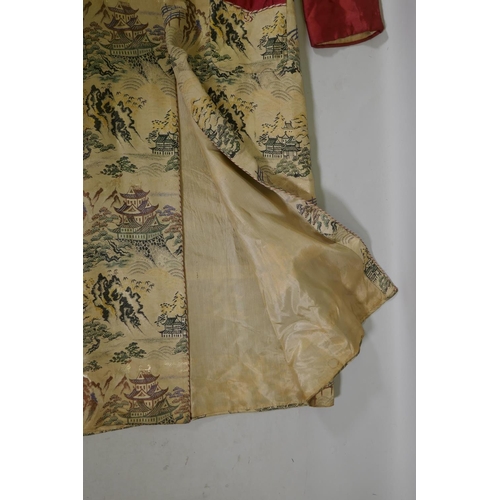 264 - A vintage Oriental embroidered silk gown, 143cm