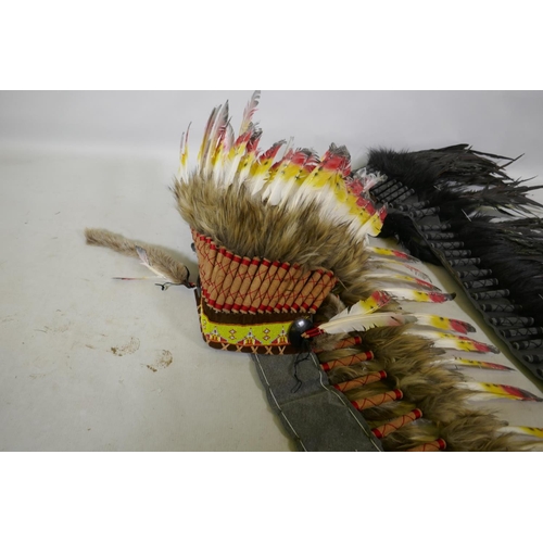 269 - A Native American replica headdress, and another