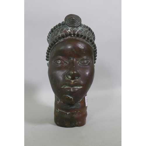 272 - An African Benin bronze head, 24cm high