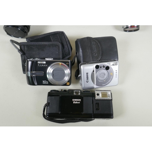 274 - A quantity of vintage 35mm and medium format cameras and accessories, to include a Canon AV-1, a Lub... 