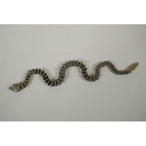 28 - A Japanese Jizai style articulated polished bronze okimono snake, 40cm long