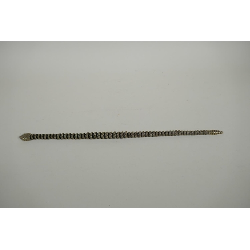 28 - A Japanese Jizai style articulated polished bronze okimono snake, 40cm long