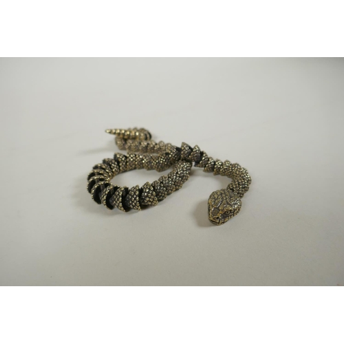 28 - A Japanese Jizai style articulated polished bronze okimono snake, 40cm long