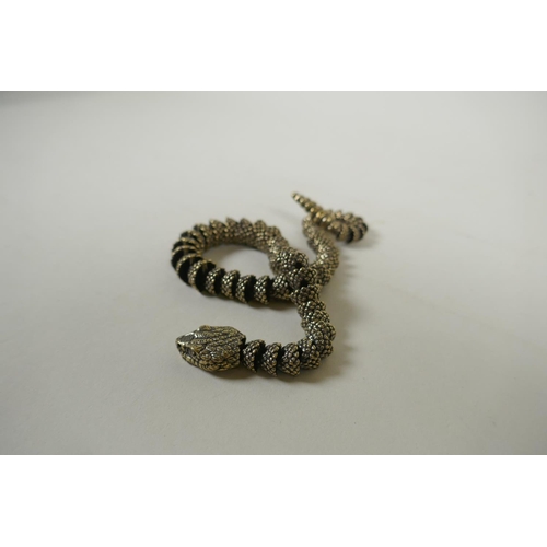 28 - A Japanese Jizai style articulated polished bronze okimono snake, 40cm long