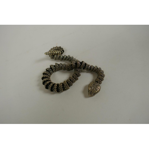 28 - A Japanese Jizai style articulated polished bronze okimono snake, 40cm long