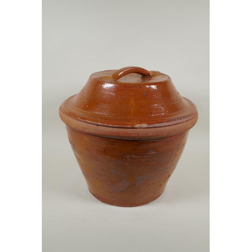 289 - An antique glazed terracotta bread crock pot, 34cm high, 36cm diameter