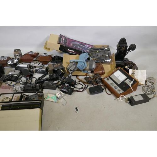 291 - A collection of vintage 35mm cameras, Pentax, Kodak Pony 135, Olympus Pen, flashlights, video proces... 