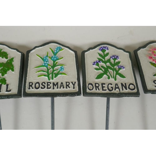 292 - Ten painted cast metal herb markers, 28cm