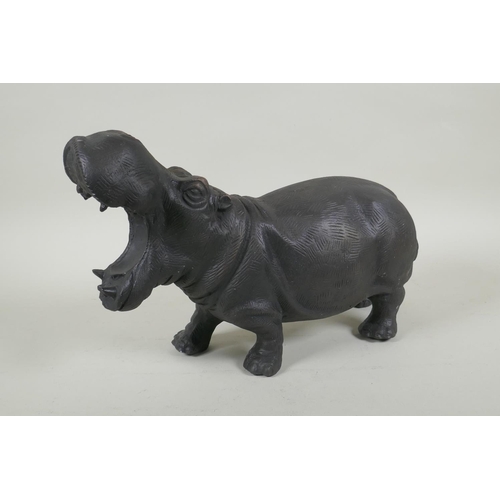 293 - A bronzed metal hippopotamus, 34cm long