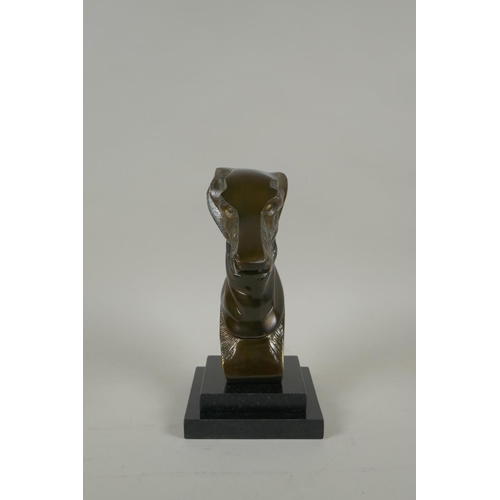 296 - A bronze head bust of a greyhound, on a black reconstituted marble base, 22cm high