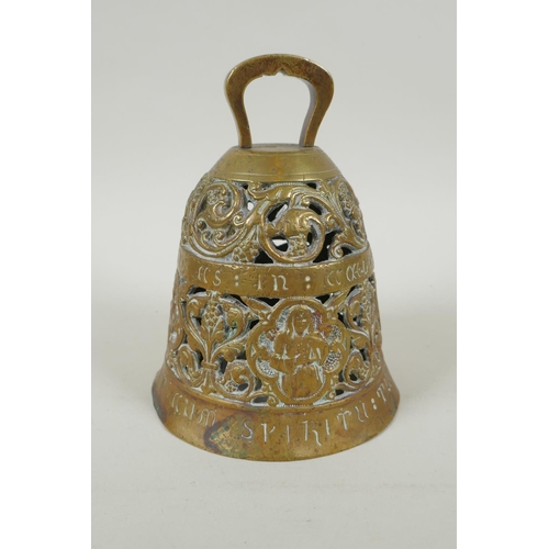 36 - An antique pierced bronze prayer bell decorated with depictions of angelic musicians and Catholic ap... 