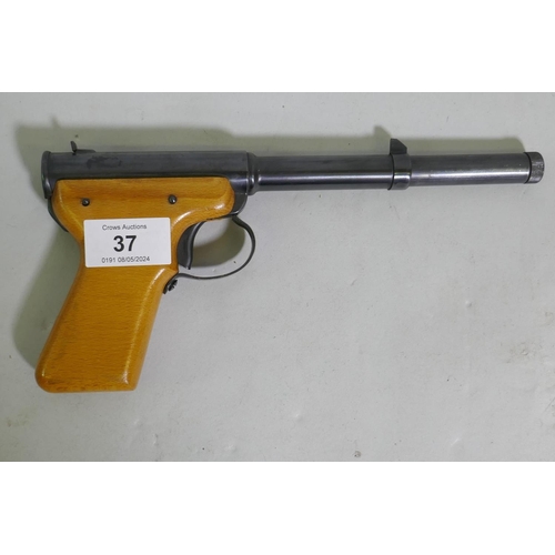 37 - A Diana Mod 2 push barrel .177 air pistol, 1956