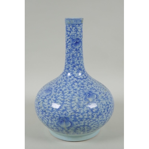 38 - A C19th Chinese blue and white porcelain bottle vase with scrolling floral decoration, AF repair, 32... 