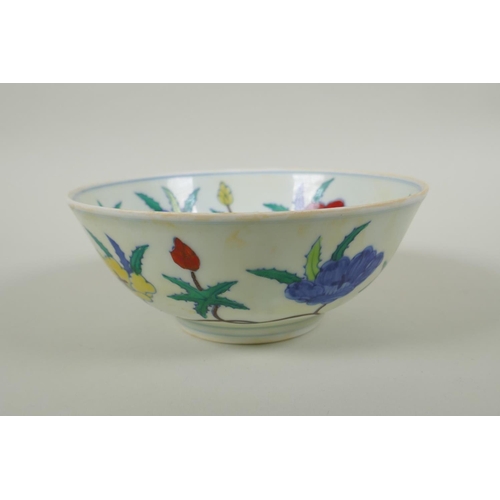 41 - A Chinese Wucai porcelain bowl with floral decoration, Chenghua 6 character mark to base, 19cm diame... 