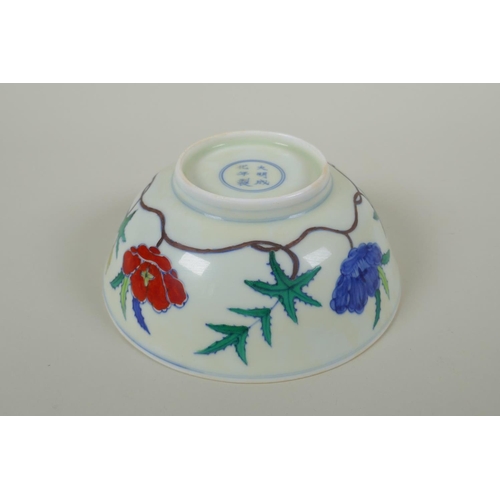 41 - A Chinese Wucai porcelain bowl with floral decoration, Chenghua 6 character mark to base, 19cm diame... 