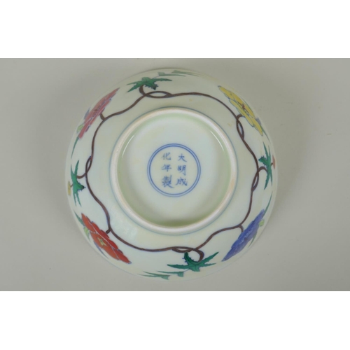 41 - A Chinese Wucai porcelain bowl with floral decoration, Chenghua 6 character mark to base, 19cm diame... 