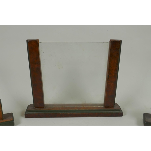 46 - Five early C20th Art Deco walnut photograph frames, largest 26cm wide, 20cm high