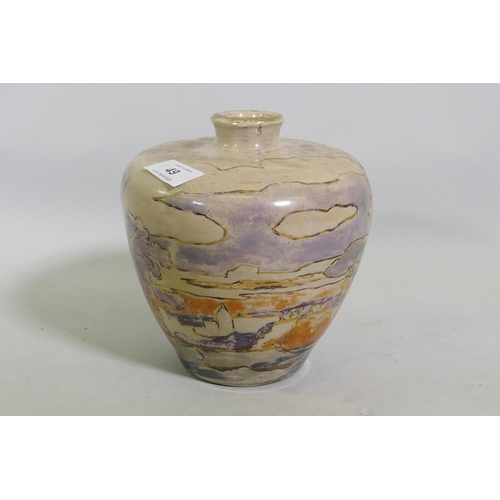 49 - A studio pottery vase, decorated in lustre glaze with a landscape, unsigned, 17cm high