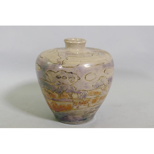 49 - A studio pottery vase, decorated in lustre glaze with a landscape, unsigned, 17cm high