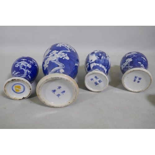 5 - A collection of C19th Chinese blue and white vases with prunus on cracked ice decoration, mismatched... 