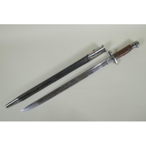 55 - A British P1907 bayonet by Wilkinson, numerous stamps to the blade and scabbard, blade length 43cm