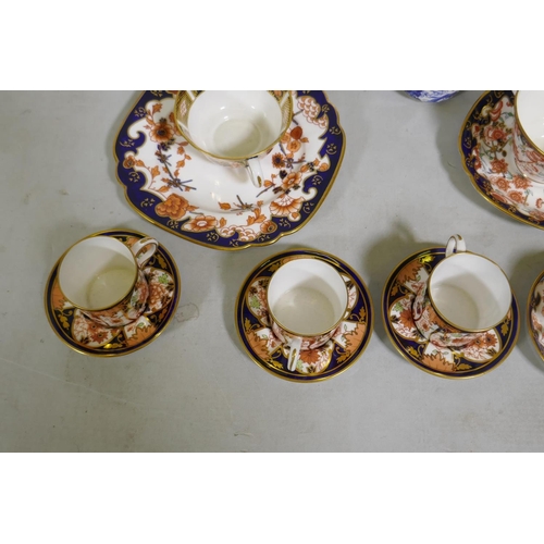 6 - A collection of Royal Crown Derby porcelain, Imari palette and Mikado blue and white, different back... 