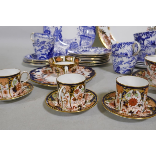 6 - A collection of Royal Crown Derby porcelain, Imari palette and Mikado blue and white, different back... 