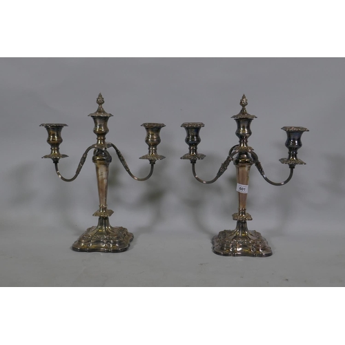 601 - A pair of Sheffield silver plated two branch candelabra, 40cm high