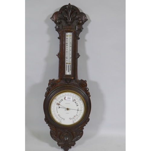 615 - A late C19th/early C20th carved oak wall barometer, the dial inscribed Maple & Co, London, 90cm ... 