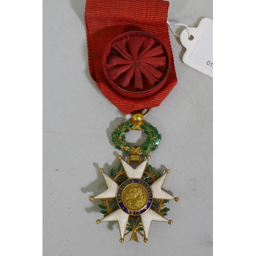 628 - A French Legion d'Honneur medal with officer's ribbon