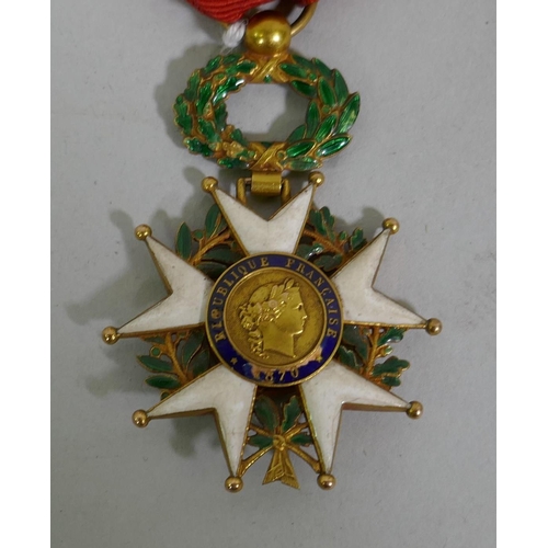 628 - A French Legion d'Honneur medal with officer's ribbon