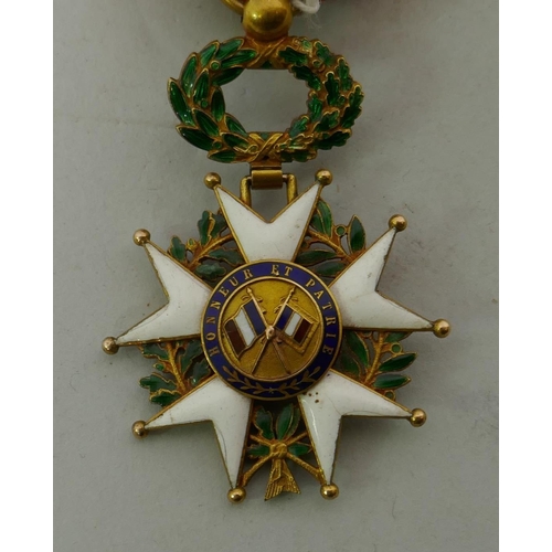 628 - A French Legion d'Honneur medal with officer's ribbon