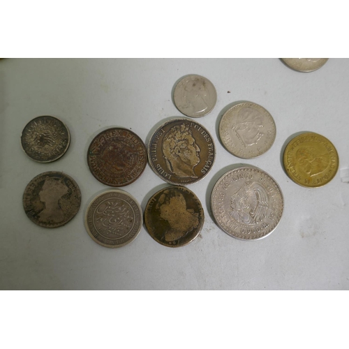 631 - A collection of antique coins and commemorative medals, 1947 Mexican silver five pesos and one peso ... 