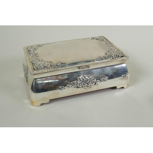 632 - A pair of Mappin & Webb silver plated salts, a silver plated bombe shaped jewellery casket and a... 